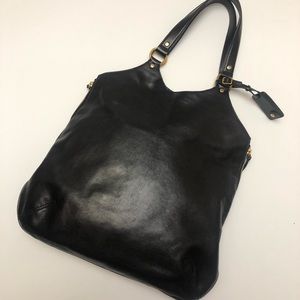 Yves Saint Laurent leather shoulder tote bag.